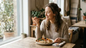 Person eating a nutritious meal slowly with focused attention in a calm natural setting