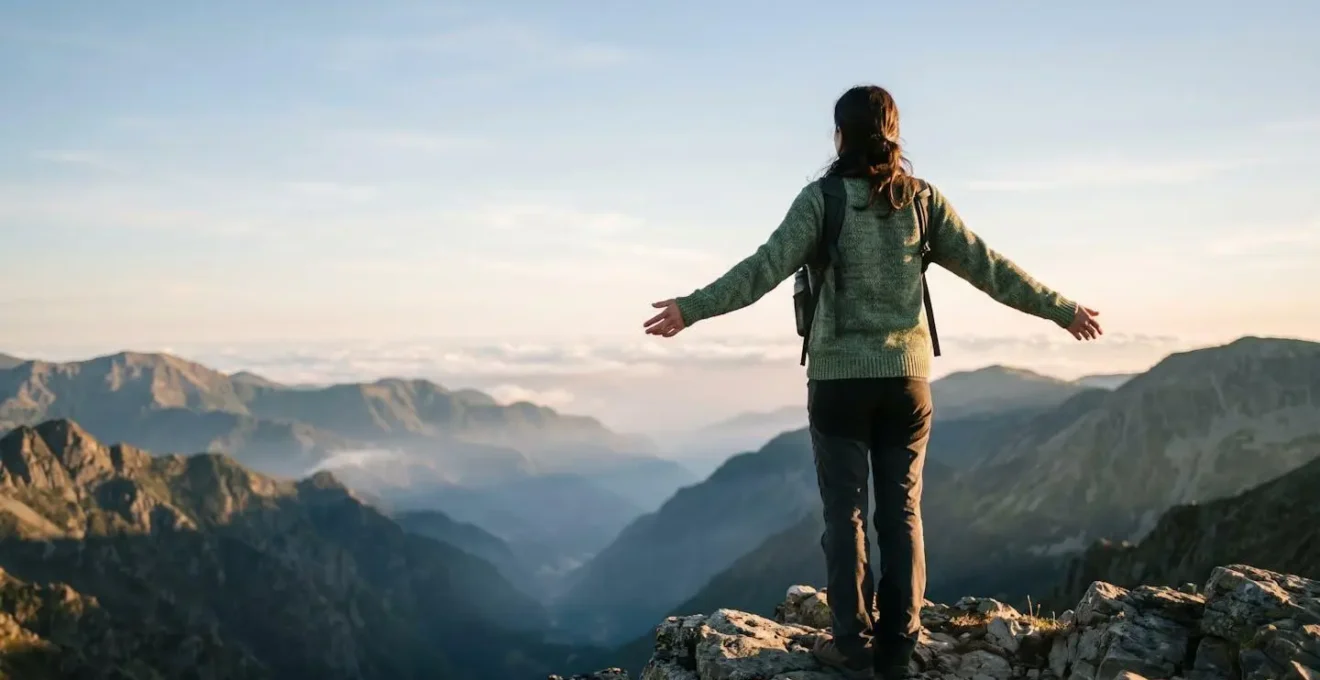 A person experiencing awe in vast natural landscape demonstrating small self phenomenon