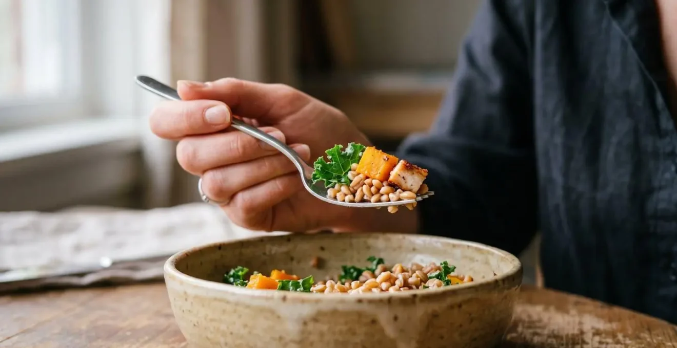 Close-up of hands holding a simple meal with complete attention during a short work break
